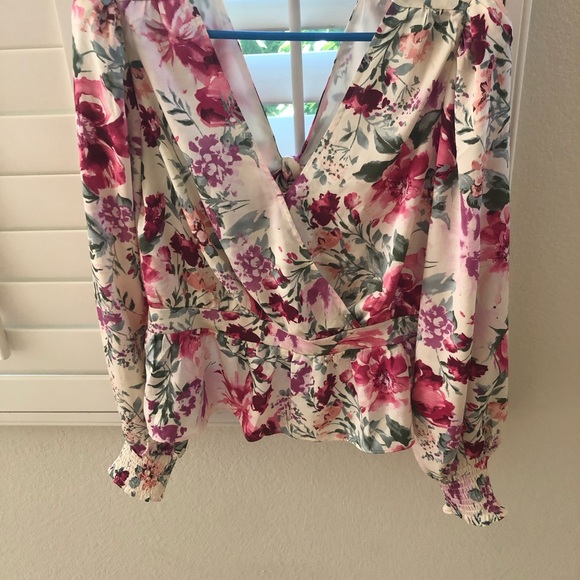 Express floral faux wrap tie back peplum top. - Picture 2 of 6